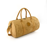 A tan kraft paper duffle bag with sturdy handles and a detachable shoulder strap, featuring a logo.