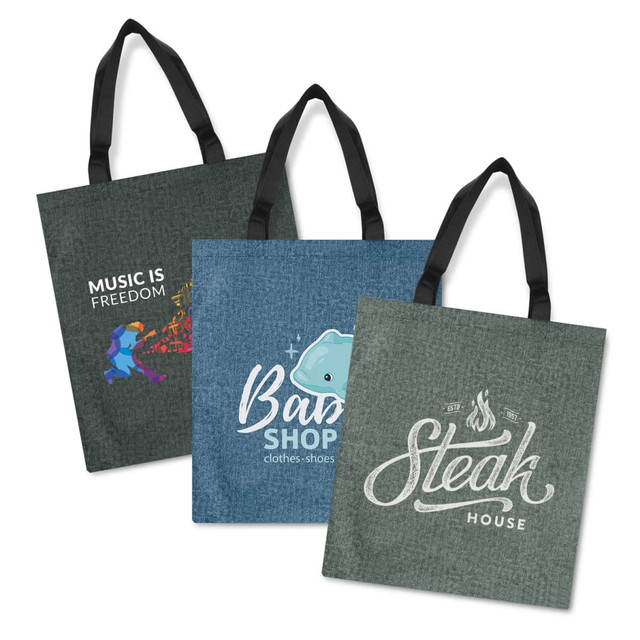 A collection of three tote bags featuring different designs, in green and blue hues, with black handles. Each has a logo.