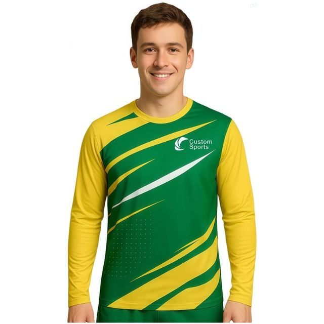 A long sleeves sports shirt in green and yellow, featuring a logo and dynamic design elements.