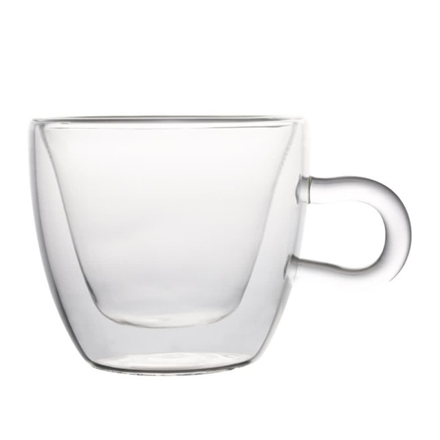 A clear glass coffee mug with a modern design and a unique handle.