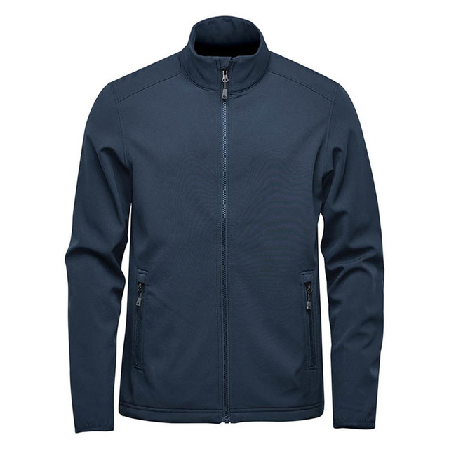 A navy blue softshell jacket with a zip front and side pockets, featuring a logo on the chest.