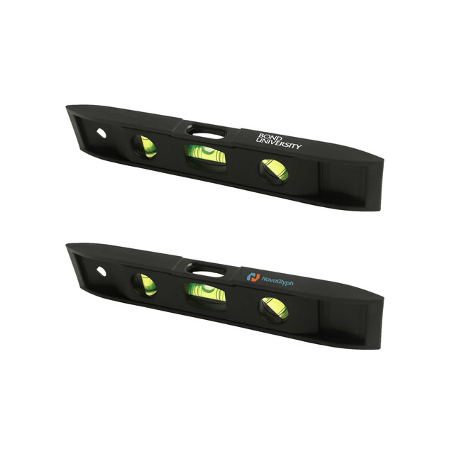 A black magnetic torpedo level featuring two spirit vials and logos on either side.