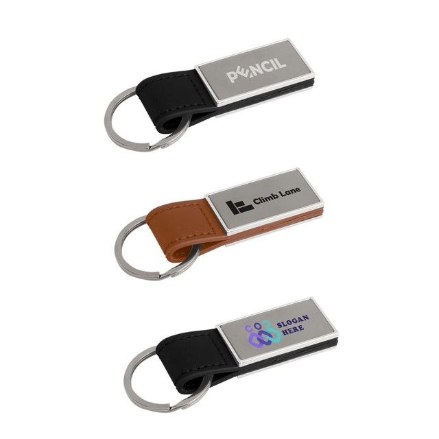 A set of three PU leather keyrings in black and brown, each featuring a metal tag and a logo or branding.