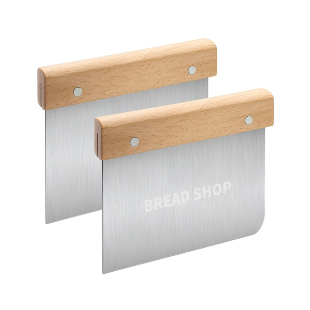 A set of two flour cutters featuring beechwood handles and stainless steel blades. The handles are light wood in colour.