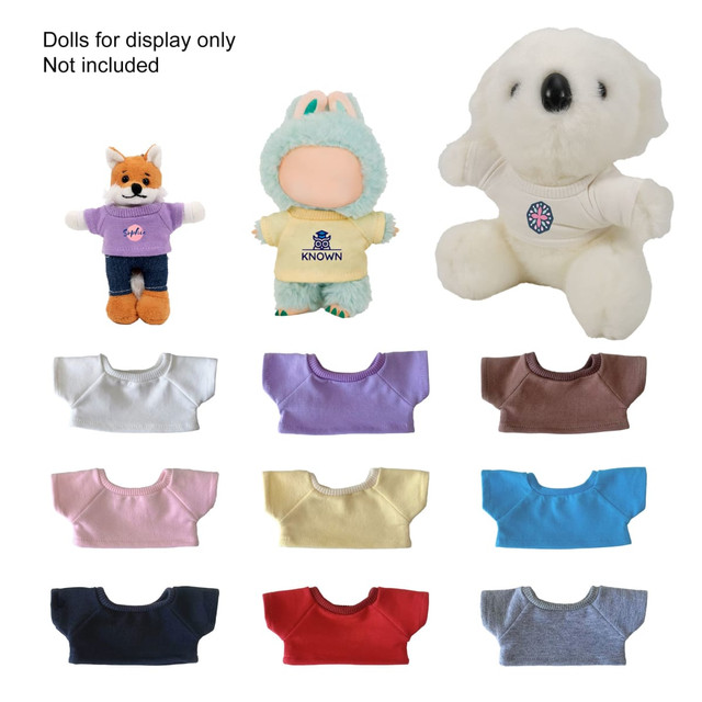 A collection of basic T-shirts in various colours for plush dolls, displayed alongside three plush dolls wearing T-shirts.