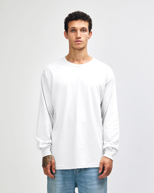 A heavyweight cotton unisex long sleeve T-shirt in white, displayed on a model with straight black hair.
