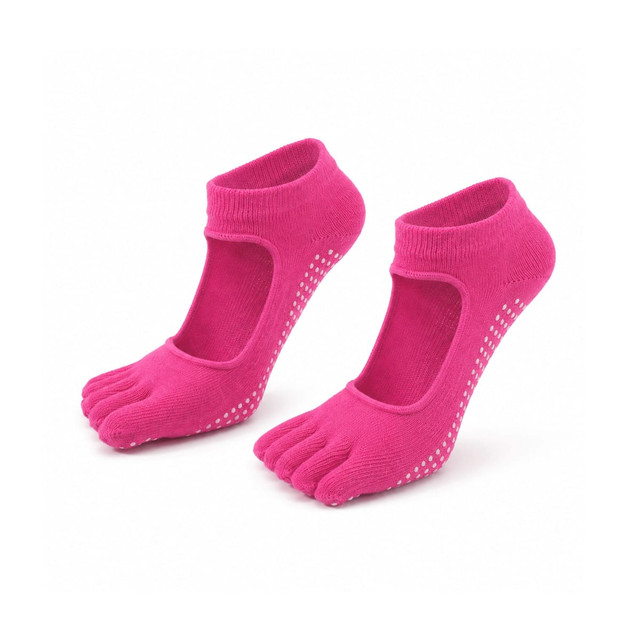 A pair of bright pink open top yoga toe socks with grip dots on the soles and a slight ankle rise.