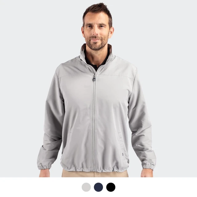 A man wearing a light grey full zip jacket with a collar, featuring an elasticated hem and cuffs.