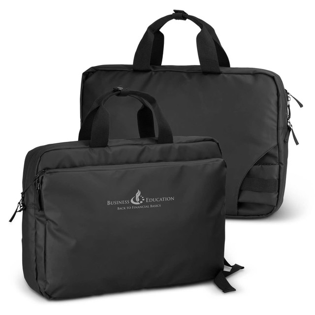 Aquinas Sling Laptop Bag in black, featuring a zippered compartment and two handles. Includes a logo on the front. Aquinas Sling Laptop Bag in black, featuring a zippered compartment and two handles. Includes a logo on the front.