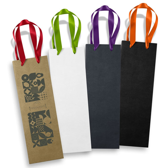A set of four tall paper bags in brown, white, black, and purple, with ribbon handles in green, purple, and orange.
