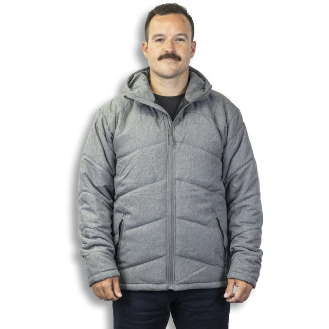 A man wearing a grey puffer jacket with a hood, featuring a front zipper and a logo.