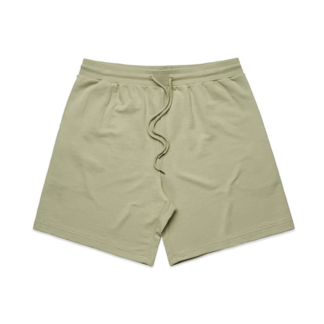 A pair of light green sports shorts featuring an elastic waistband and a drawstring. Includes a logo. A pair of light green sports shorts featuring an elastic waistband and a drawstring. Includes a logo.