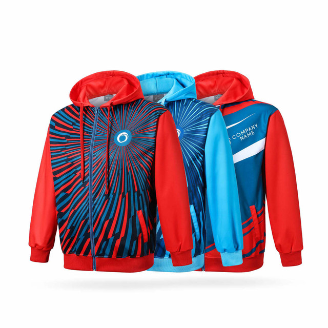 A vibrant men's polyester track jacket in red and blue, featuring a patterned design and a logo.