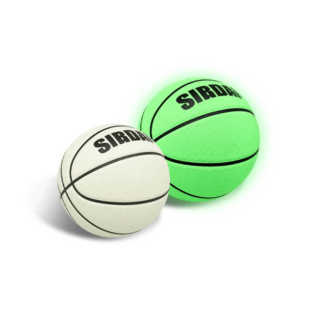 A glowing green and white PU basketball, featuring a logo, placed side by side.