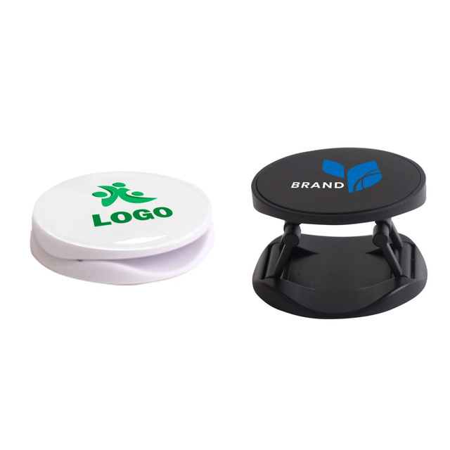 Two round phone holders in white and black, each featuring a logo on the top surface. Two round phone holders in white and black, each featuring a logo on the top surface.