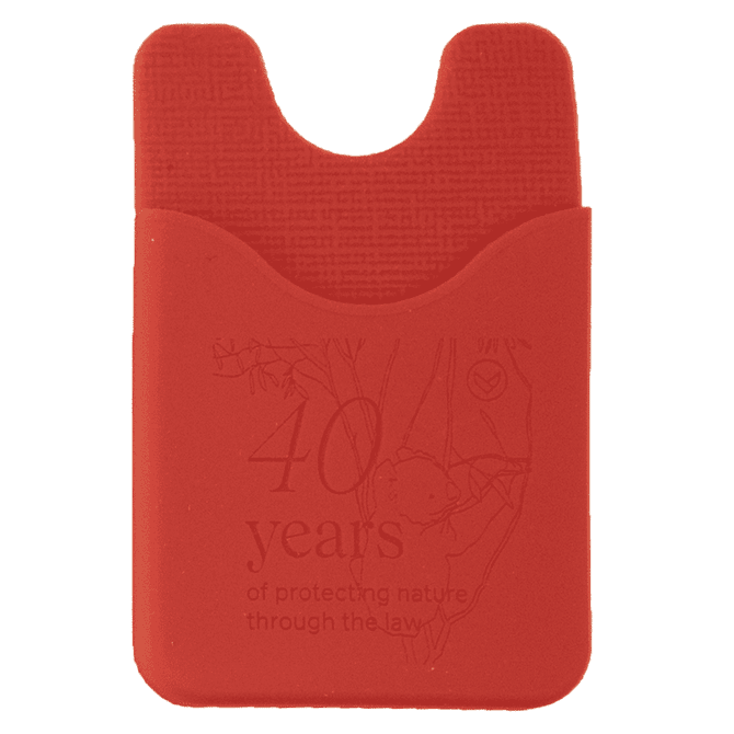 A red silicone phone wallet with a textured surface and a cut-out section at the top. It features a logo.