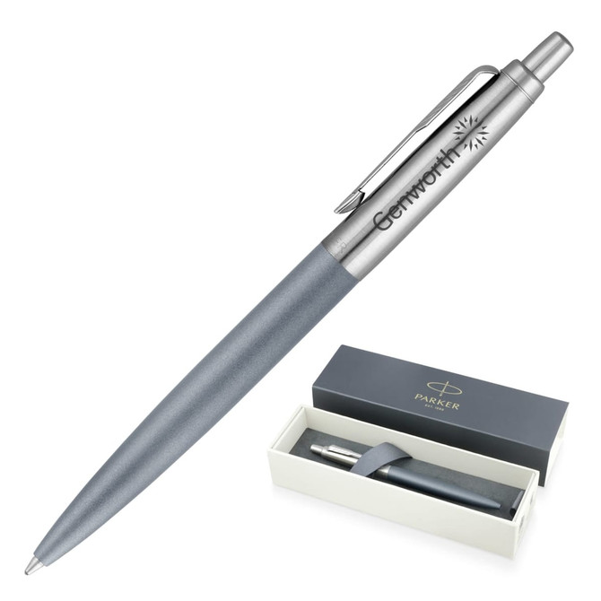 A matte grey ballpoint pen with a silver clip and a branded box.