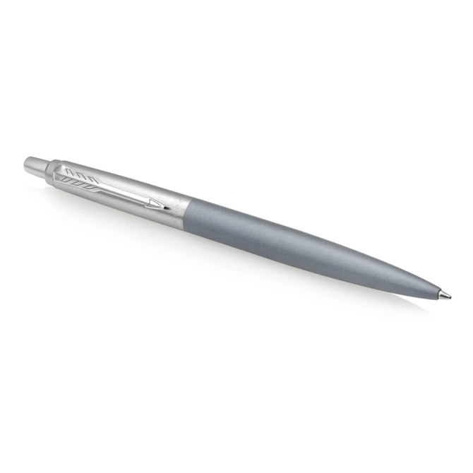 A ballpoint pen in matte grey with a silver clip and a branded logo on the clip.