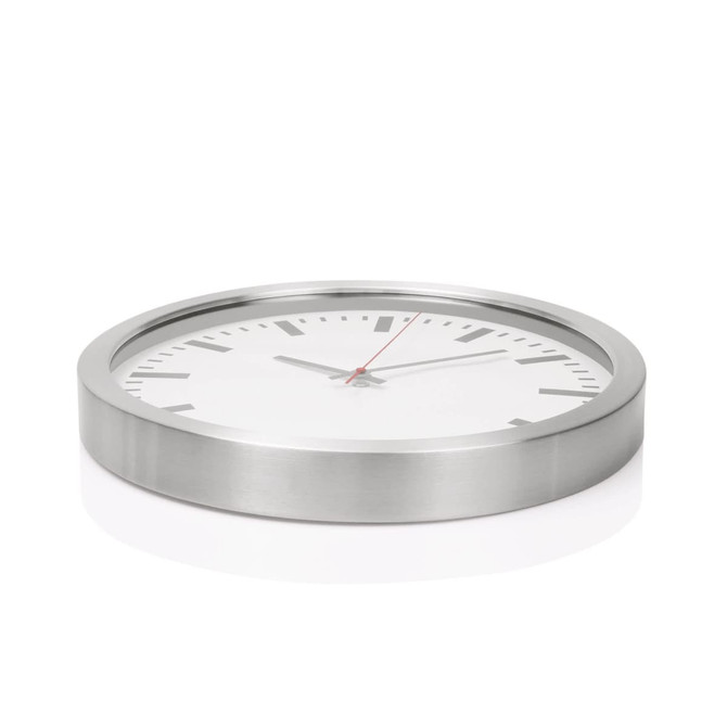 A wall clock featuring a sleek aluminium frame and a white face with black hour markers and red hands.