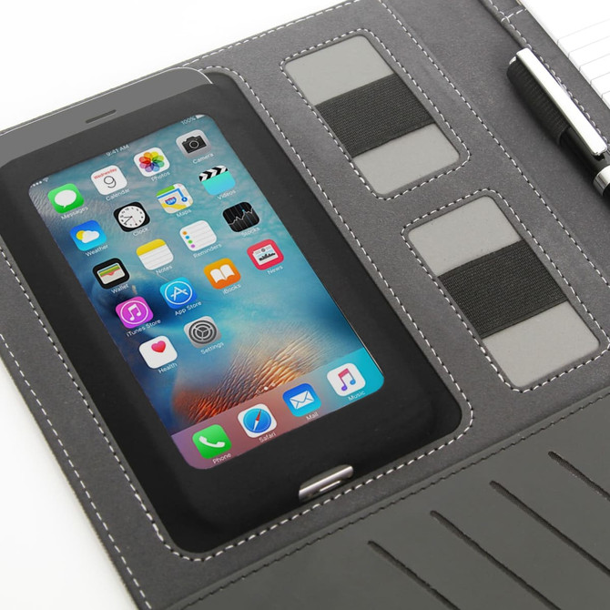 A black executive tech portfolio featuring a tablet insert and elastic pockets for cards. Includes a pen.