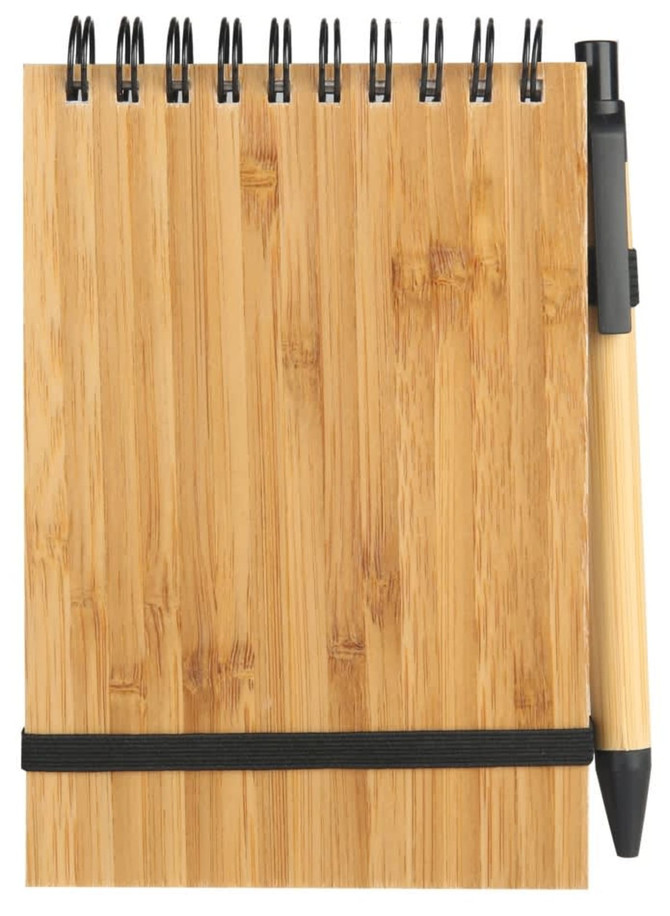 A bamboo notebook with a black strap and a matching pen beside it, featuring a simple design and a spiral binding.