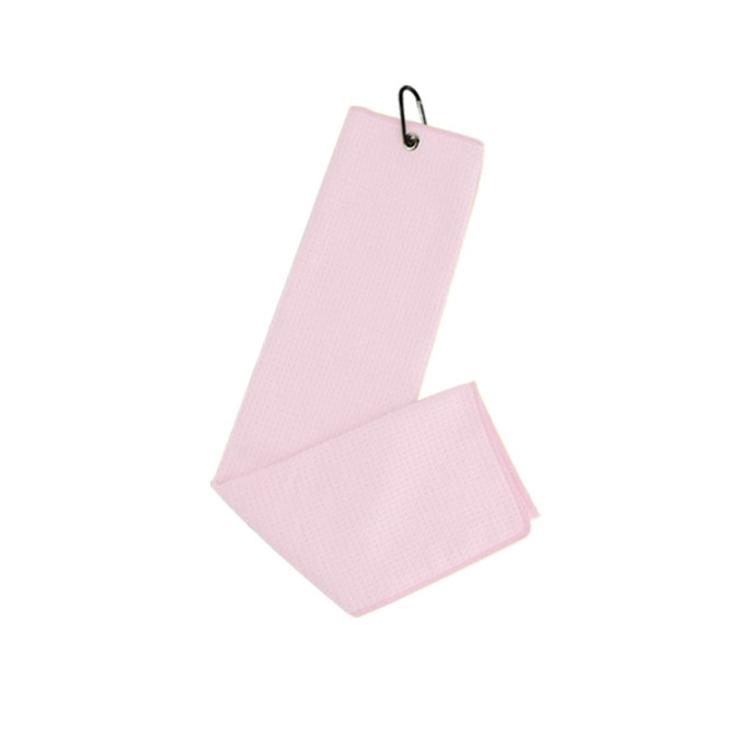 A pink waffle golf towel with a loop for easy attachment, featuring a textured surface.