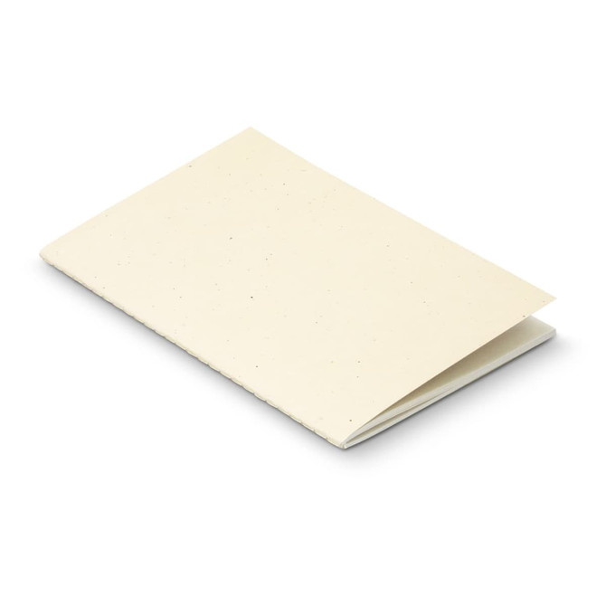 A soft cover notebook in a cream colour with visible speckles and a simple design. It features a logo on the front.