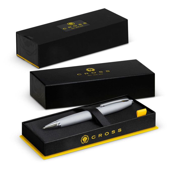 A sleek grey Cross Calais ballpoint pen in a black and yellow presentation box with a logo.