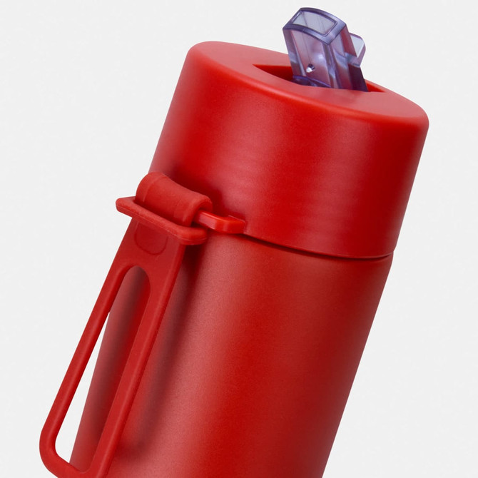A drink bottle in vibrant red, featuring a flip-top lid and a handle for easy carrying. Includes a logo.