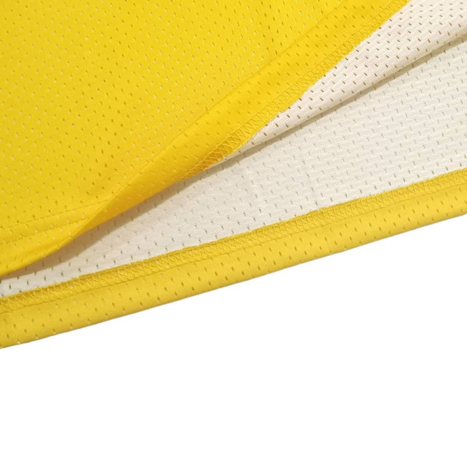 A yellow sleeveless sport jersey made from 100% polyester with mesh fabric, featuring a white interior and a logo.