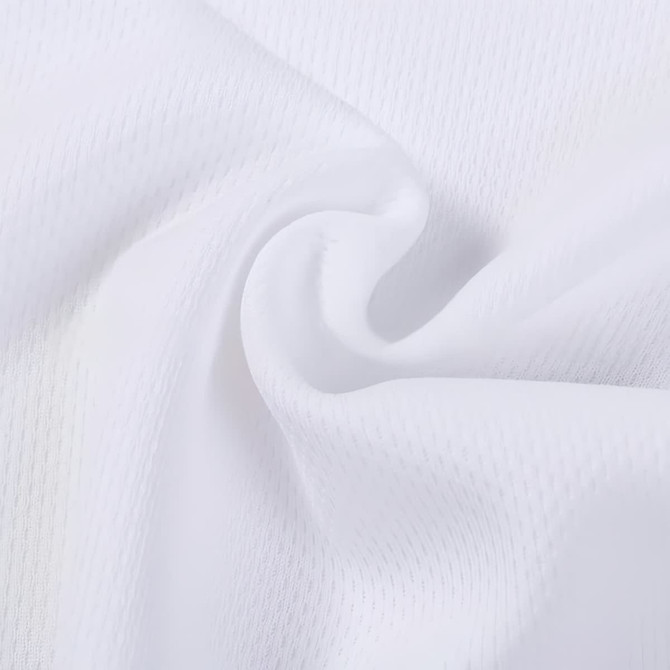 A close-up of white polyester fabric with a textured pattern, featuring a smooth, soft appearance.