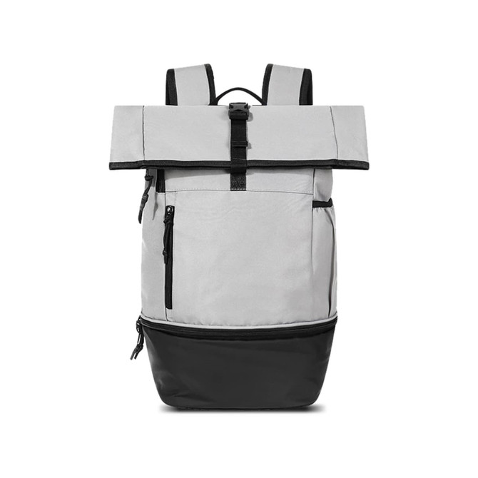 A grey and black roll top backpack with zippers and adjustable straps, featuring a logo.