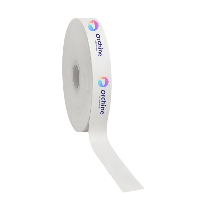 A roll of white satin polyester ribbon featuring a logo printed along its side.