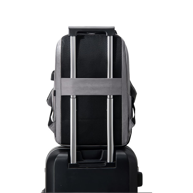 A black business backpack featuring a USB charging port, designed to fit over suitcase handles for easy transport.
