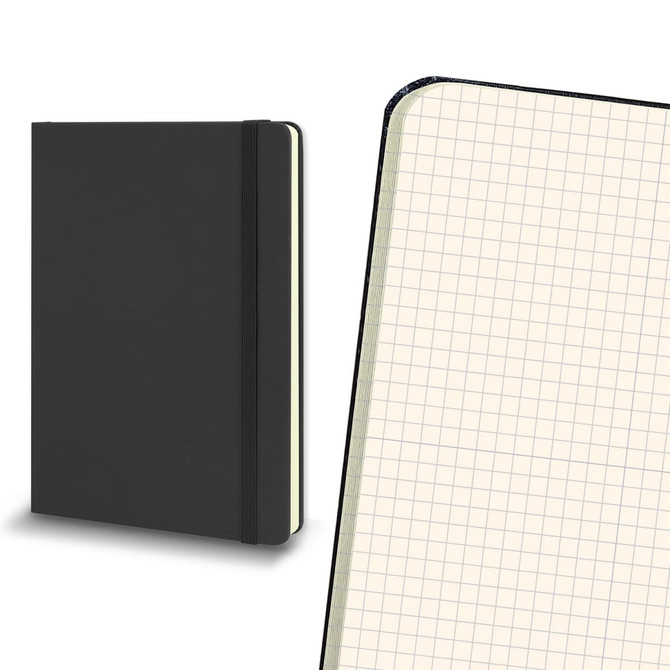 A large black Moleskine hard cover notebook featuring grid pages and an elastic band closure.