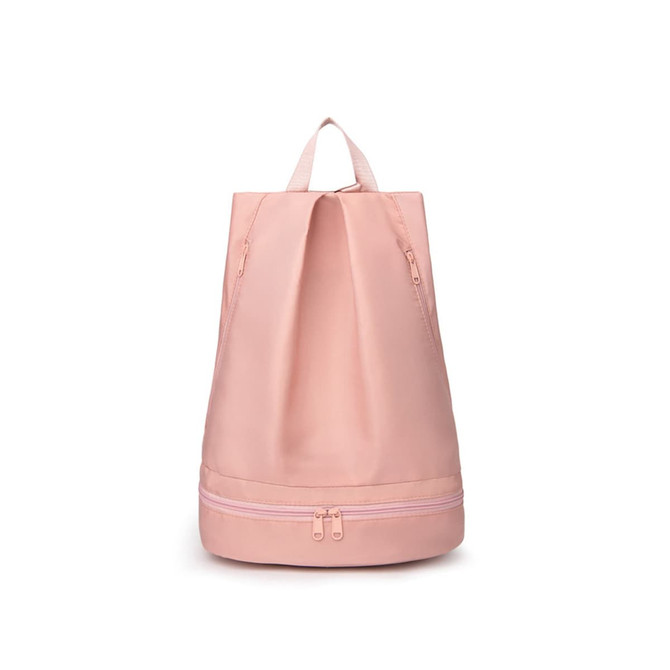 A pink backpack featuring a separate bottom compartment and a handle for easy carrying, with a logo.
