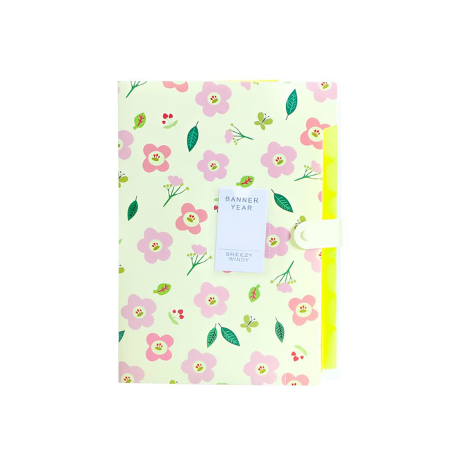 An expandable file folder in pastel yellow with a floral print of pink flowers and green leaves, featuring a closure.