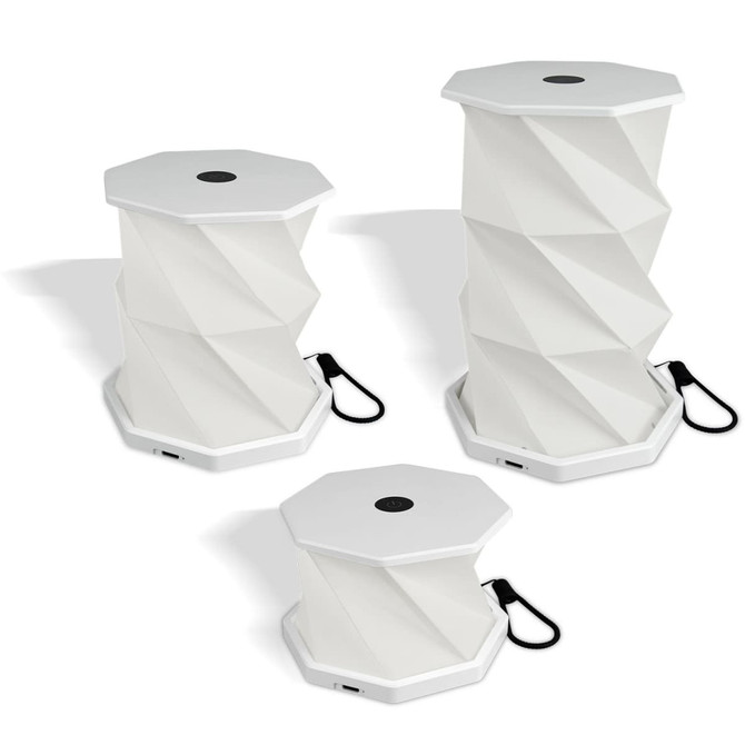 A white foldable lantern with a geometric design, featuring a handle for carrying. It is shown in three different sizes.