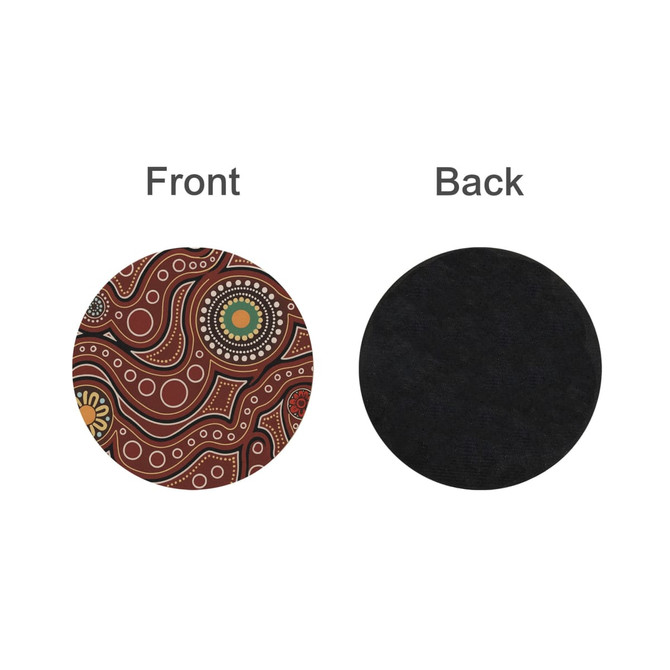 A round soft diatomaceous coaster featuring a vibrant Aboriginal-style design on the front and a black back.