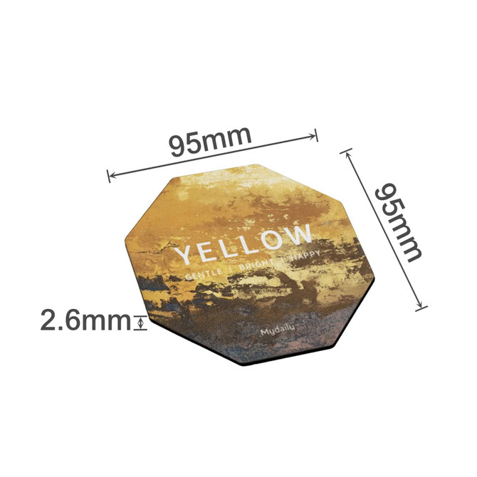 An octagonal coaster in yellow and gold tones, featuring a logo and dimensions of 95mm by 2.6mm.