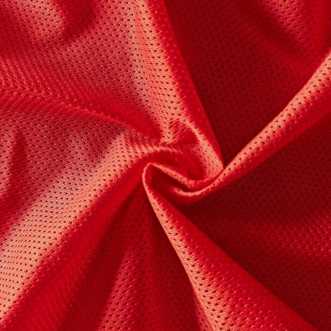 A close-up of a red polyester mesh fabric, featuring a breathable, textured surface. The fabric is lightweight and soft.