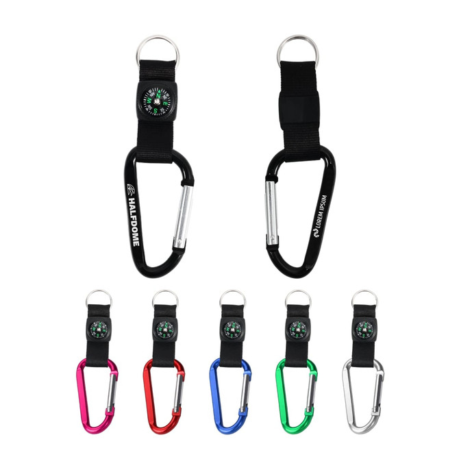 A black carabiner keychain featuring a compass, alongside keychains in red, blue, green, pink, and silver.