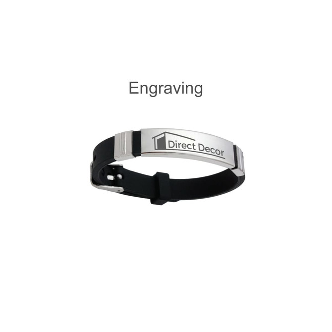 A metal bracelet with a silver plaque on a black strap. The plaque features a logo.