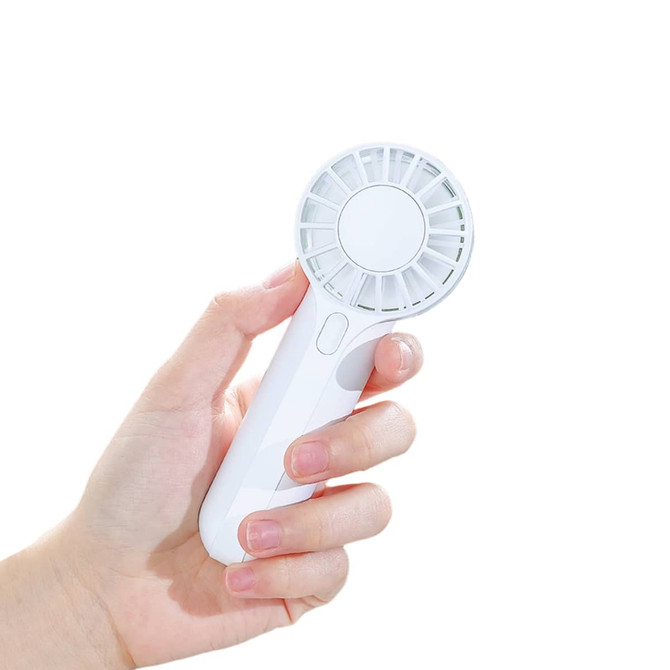 A handheld fan in white, held in a hand, featuring a circular blade design and a power button.