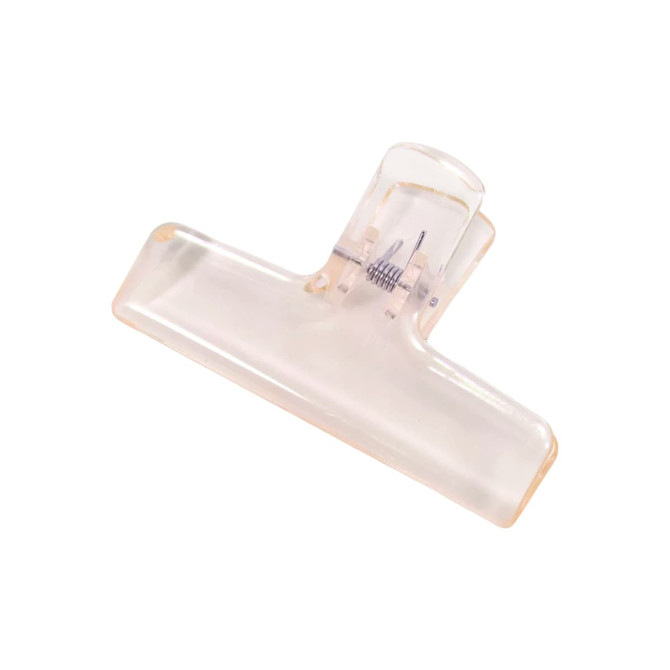 A translucent plastic clip in a clear colour, featuring a metal spring mechanism for gripping.