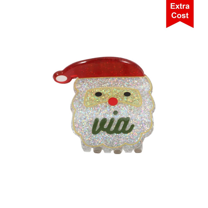 A festive hair claw featuring a sparkly Santa design with a red hat and green detailing.