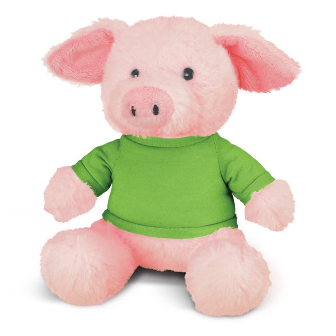 A pink pig plush toy wearing a green shirt, with floppy ears and a smiling face.