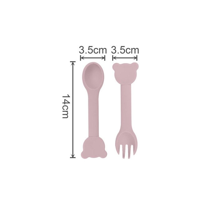 Bear-shaped silicone cutlery for kids in soft pink, featuring a spoon and fork with rounded bear heads.