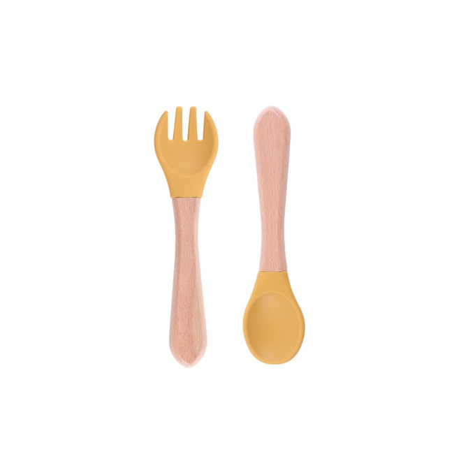 Ergonomic silicone kids cutlery set featuring a yellow fork and spoon with wooden handles.