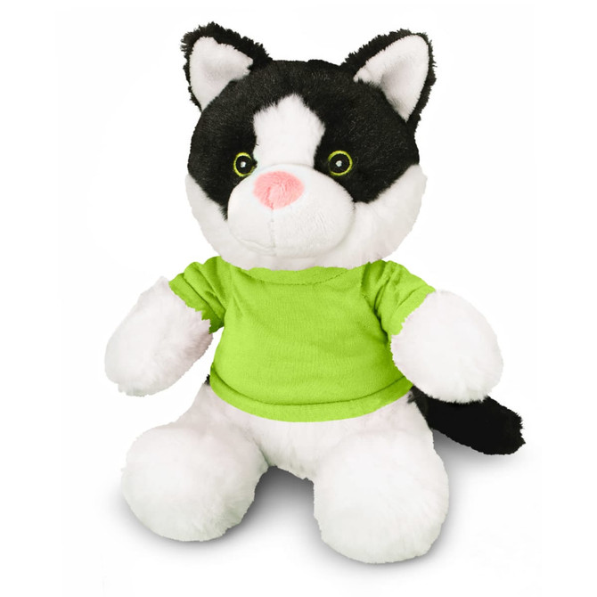 A black and white cat plush toy wearing a bright green shirt with green eyes and a pink nose.